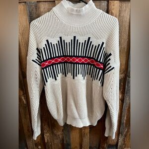 Stylish Cream Sweater with Red and Black Accents